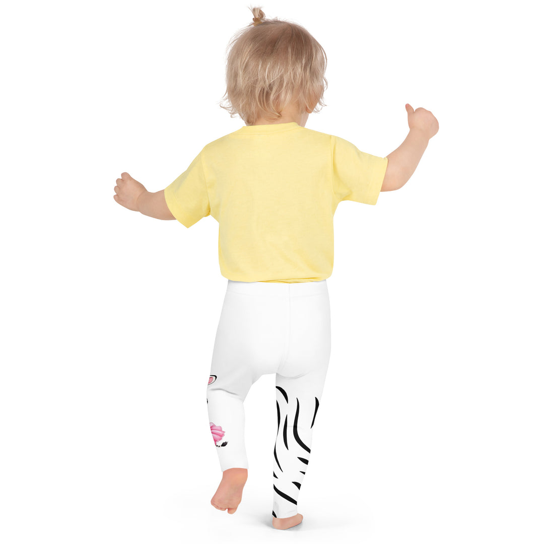  Ballet Black and White Zebra Girls Leggings, white background with a black and white zebra wearing a pink ballet skirt on the lower part of one leg, and black zebra stripes on the lower part of the other leg, back pose on model
