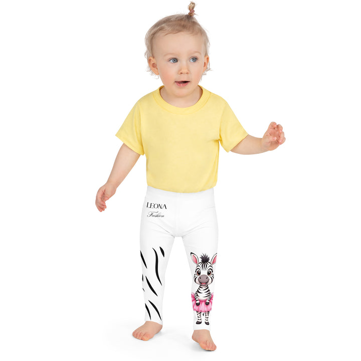 Ballet Black and White Zebra Girls Leggings, white background with a black and white zebra wearing a pink ballet skirt on the lower part of one leg, and black zebra stripes on the lower part of the other leg, front close-up view on model-with a visible 'Leona Fashion' text on the design