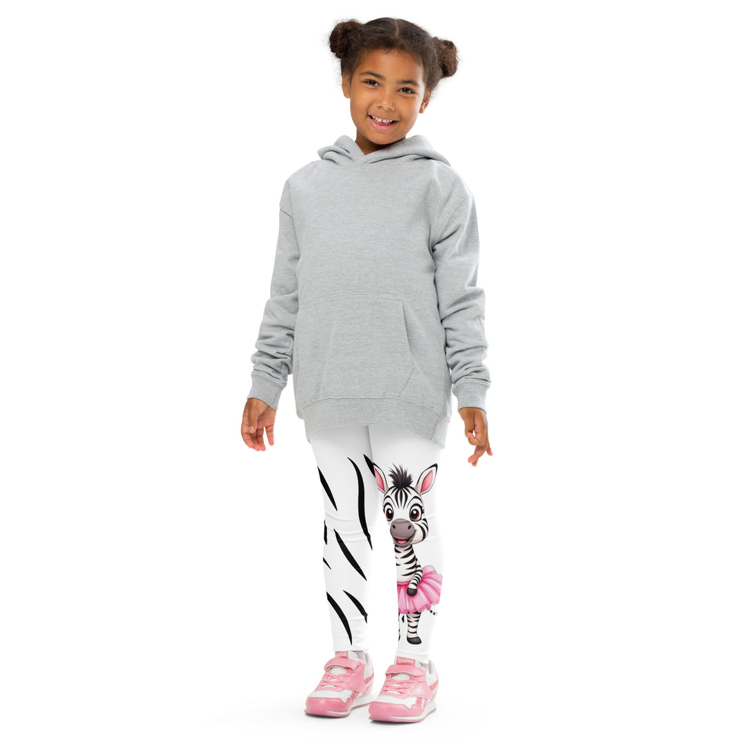  Ballet Black and White Zebra Girls Leggings, white background with a black and white zebra wearing a pink ballet skirt on the lower part of one leg, and black zebra stripes on the lower part of the other leg, front pose with arms at sides on model