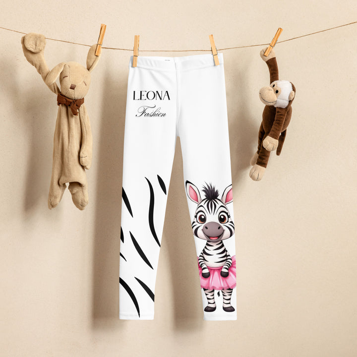  Ballet Black and White Zebra Girls Leggings, white background with a black and white zebra wearing a pink ballet skirt on the lower part of one leg, and black zebra stripes on the lower part of the other leg, front view on hanger-with a visible 'Leona Fashion' text on the design
