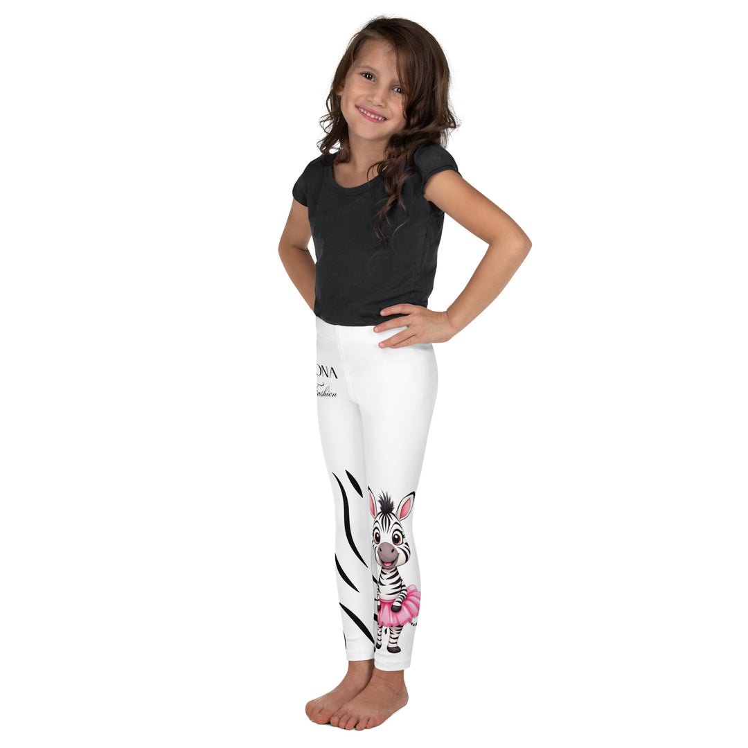 Ballet Black and White Zebra Girls Leggings, white background with a black and white zebra wearing a pink ballet skirt on the lower part of one leg, and black zebra stripes on the lower part of the other leg, left side view on model