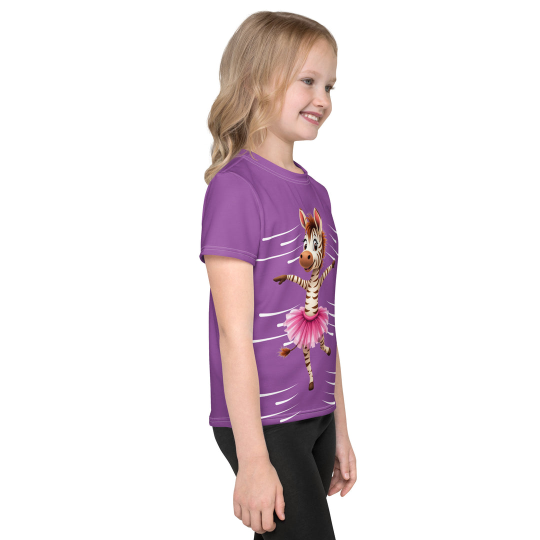 Ballet Sweet Zebra Girls T-shirt, purple background with a brown and white zebra in a pink ballet skirt standing on one leg with arms extended, surrounded by white movement lines, and a music note near the bottom on the back, right side view on model