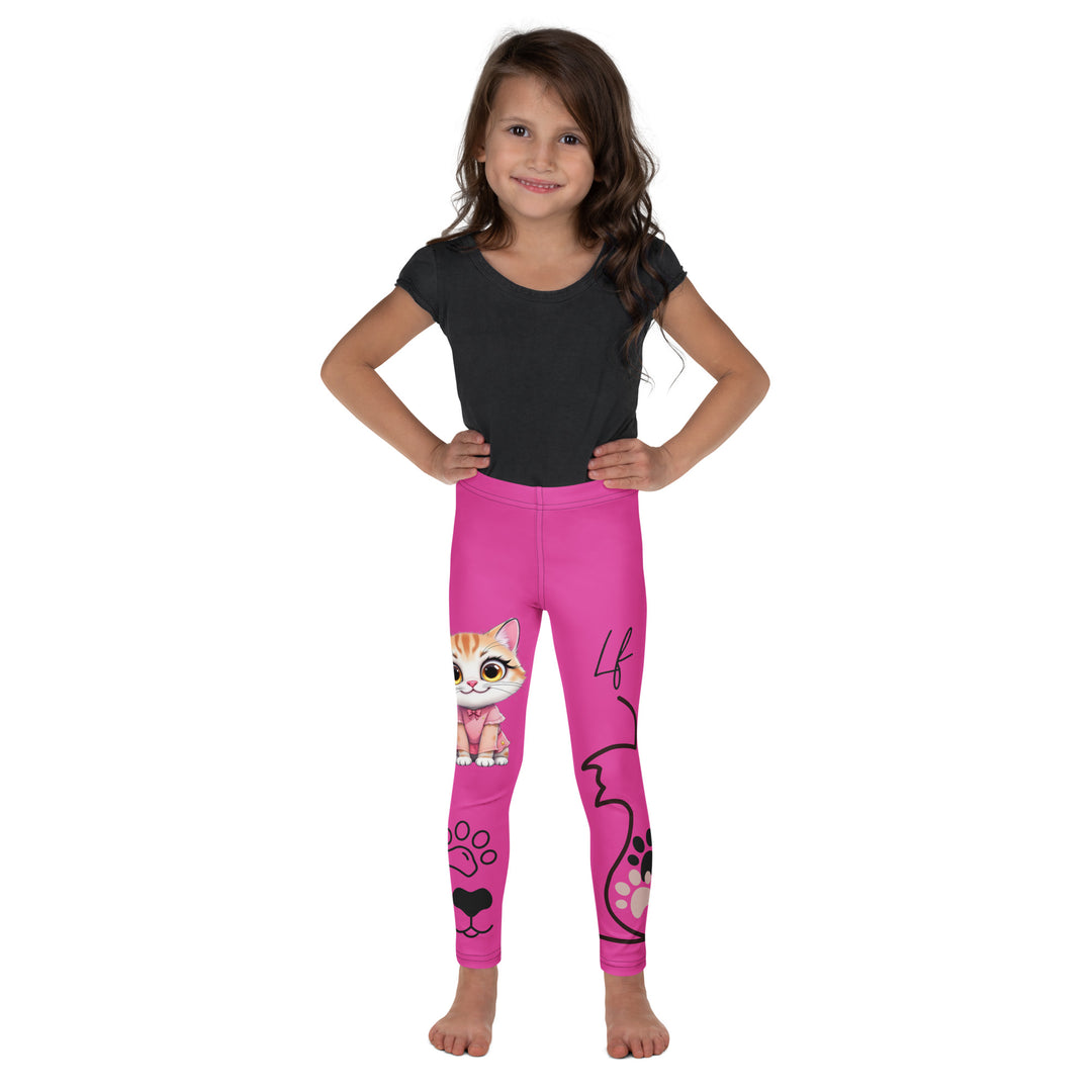 Cat Trace Girls Leggings, pink background with a yellow cat wearing a pink dress at the top of one leg, black paw prints and a black cat nose below, and a black line-drawn cat with black and cream paw prints on the other leg, front view on model