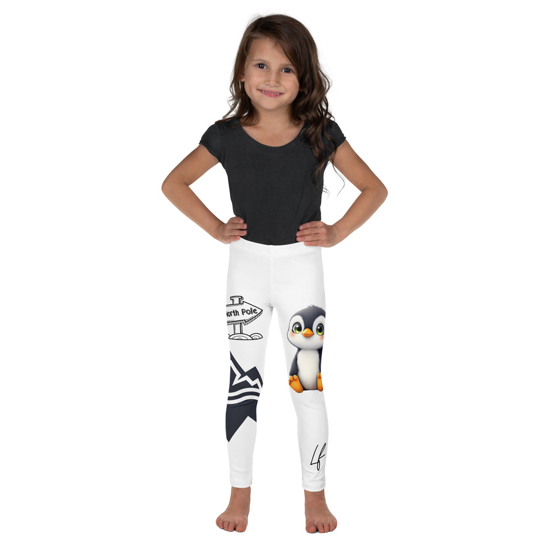 Chilly Penguin Girls Leggings, white background with a black and white small penguin sitting with green eyes on one leg, and a black and white iceberg with a wooden snow sign that says "NORTH POLE" on the other leg, front view on model