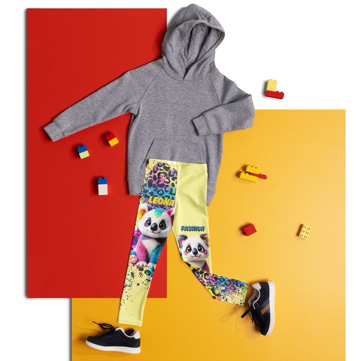  ColorSplash Panda Girls Leggings, yellow background with a colorful koala on each leg, featuring a vibrant tiger-striped design blending into the yellow background, partial yellow areas, front view laid flat on floor-with a visible 'Leona Fashion' text on the design