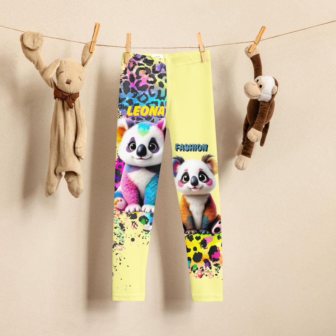 ColorSplash Panda Girls Leggings, yellow background with a colorful koala on each leg, featuring a vibrant tiger-striped design blending into the yellow background, partial yellow areas, front view on hanger-with a visible 'Leona Fashion' text on the design