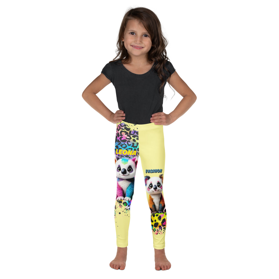 ColorSplash Panda Girls Leggings, yellow background with a colorful koala on each leg, featuring a vibrant tiger-striped design blending into the yellow background, partial yellow areas, relaxed front pose on model-with a visible 'Leona Fashion' text on the design