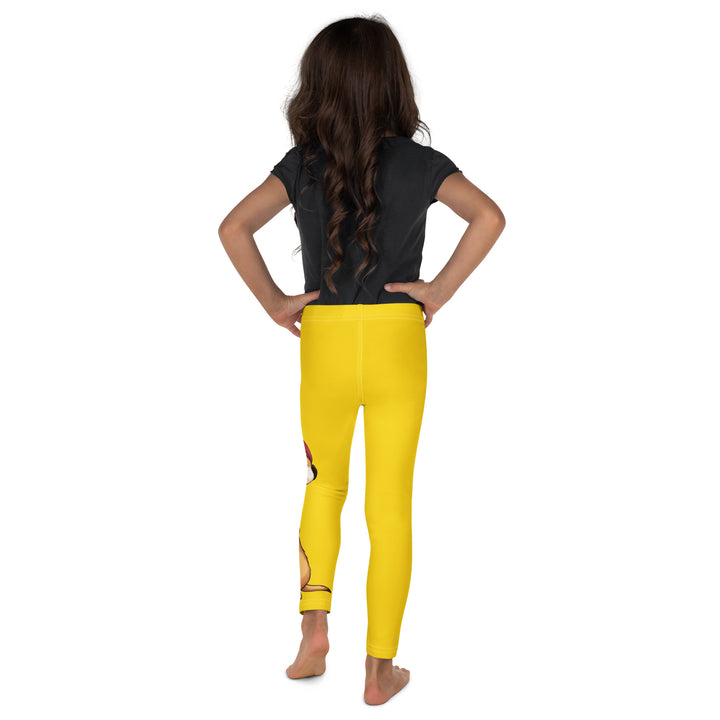 Cool Meerkat Girls Leggings, yellow background with a meerkat wearing a red cap on one leg and a paw graphic on the other leg appearing to come through the fabric, back view on model