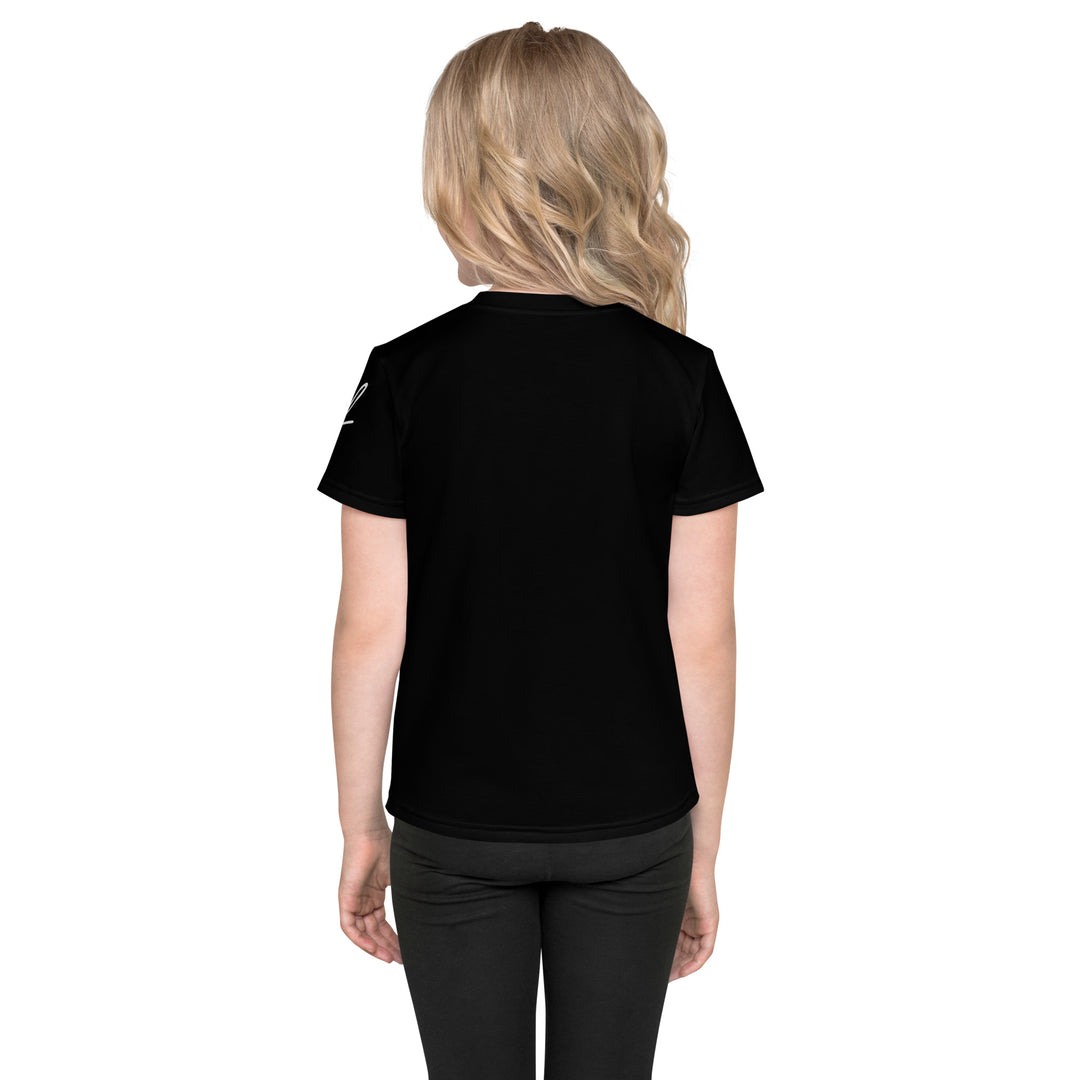  Coral Dolphin Girls T-shirt, black background with a pink baby dolphin sitting on a white cloud surrounded by small sparkling yellow stars, back view on model