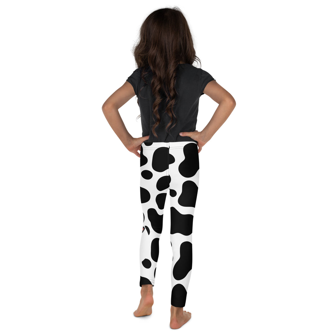 Cowlicious Love Girls Leggings, white background with black cow-like spots and a small black and white cow with a flower in its hair on one leg, back view on model
