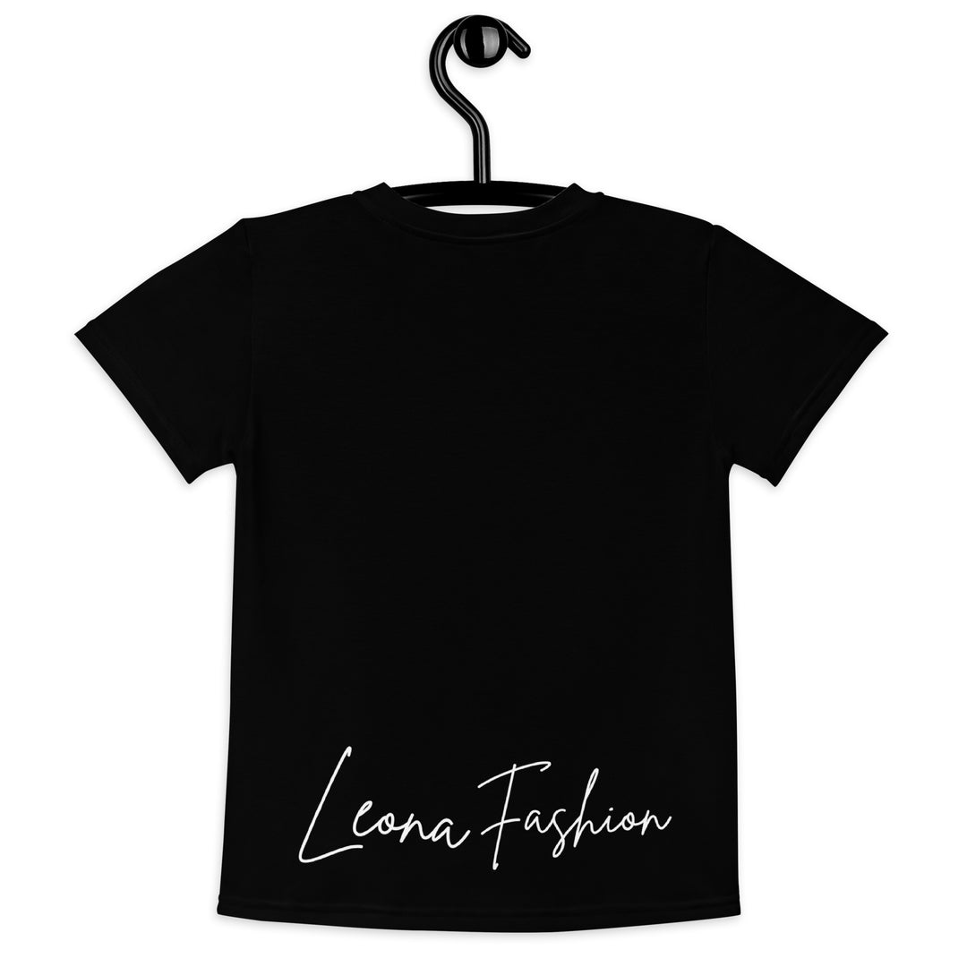  Cowlicious Love Girls T-shirt, black background with a black and white cow featuring a flower in its hair on the front, and a black and white cow-print heart outlined in pink behind it, back view on hanger-with a visible 'Leona Fashion' text on the design