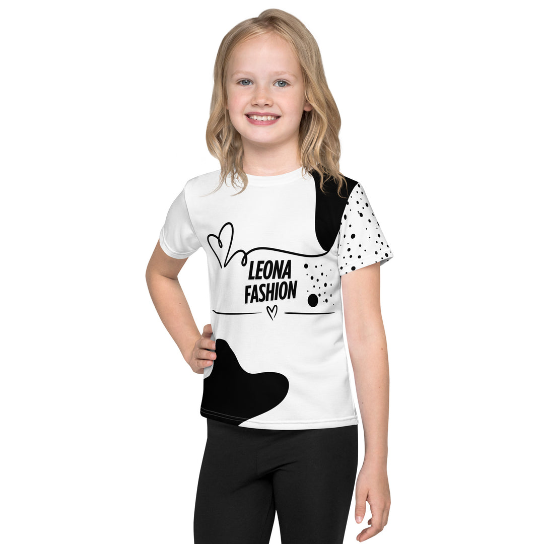  Dot & Line Girls T-shirt, white background with black spots, lines, and a heart on the front, black dots on the left sleeve, and a black heart with a line detail near the bottom on the back, front view on model-with a visible 'Leona Fashion' text on the design