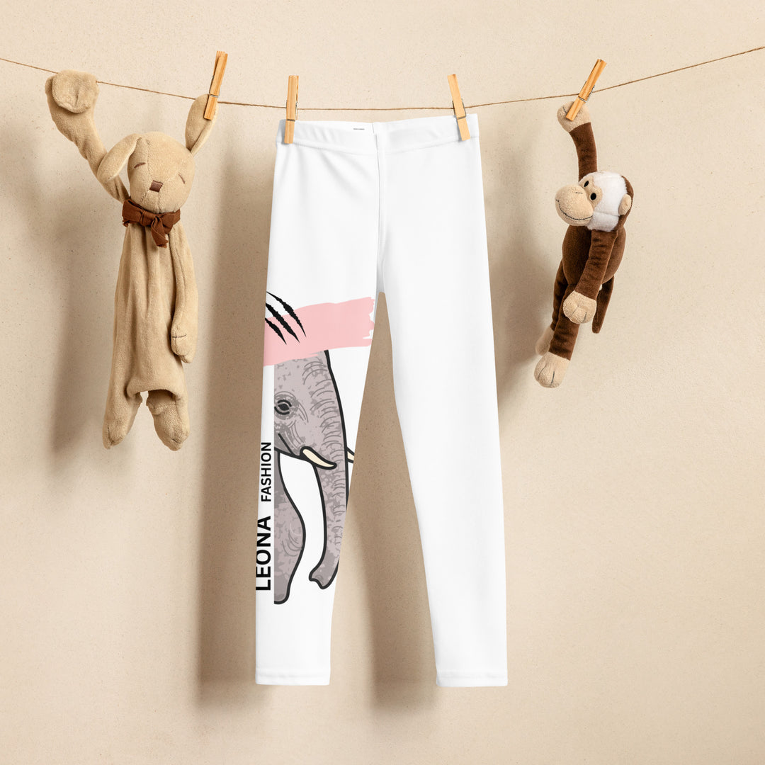 Elephant Whispers Girls Leggings, white background with gray elephant in profile on one leg, visible trunk, and soft blush pink stripe detail across the head, front view on hanger-with a visible 'Leona Fashion' text on the design