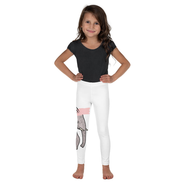 Elephant Whispers Girls Leggings, white background with gray elephant in profile on one leg, visible trunk, and soft blush pink stripe detail across the head, relaxed front pose on model