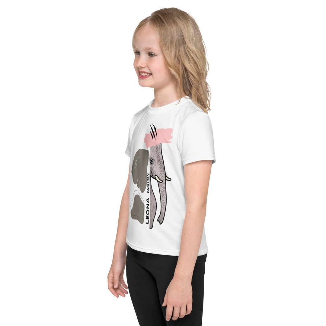  Elephant Whispers Girls T-shirt, white background with gray elephant in profile on one side, visible trunk, and soft blush pink stripe detail across the head, left side view on model-with a visible 'Leona Fashion' text on the design
