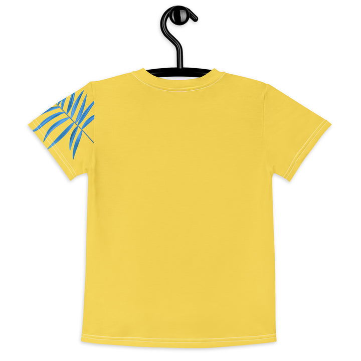 Fly Baby Parrot Girls T-shirt, yellow background with a small pink baby parrot with spread wings on the front, "I CAN DO IT" text in blue and pink letters below, and a blue tropical leaf on the left sleeve, back view on hanger