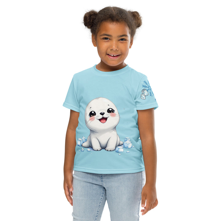  Frosty Seal Girls T-shirt, light sky blue background with a white baby seal surrounded by ice cubes on the front, blue and white snowflakes on the left sleeve, and an icy blue iceberg on the back, front pose with arms at sides on model