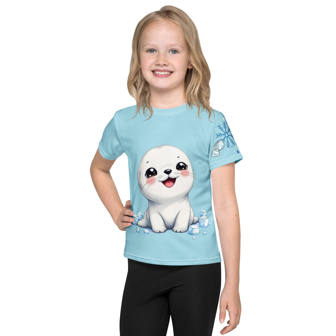 Frosty Seal Girls T-shirt, light sky blue background with a white baby seal surrounded by ice cubes on the front, blue and white snowflakes on the left sleeve, and an icy blue iceberg on the back, front view on model