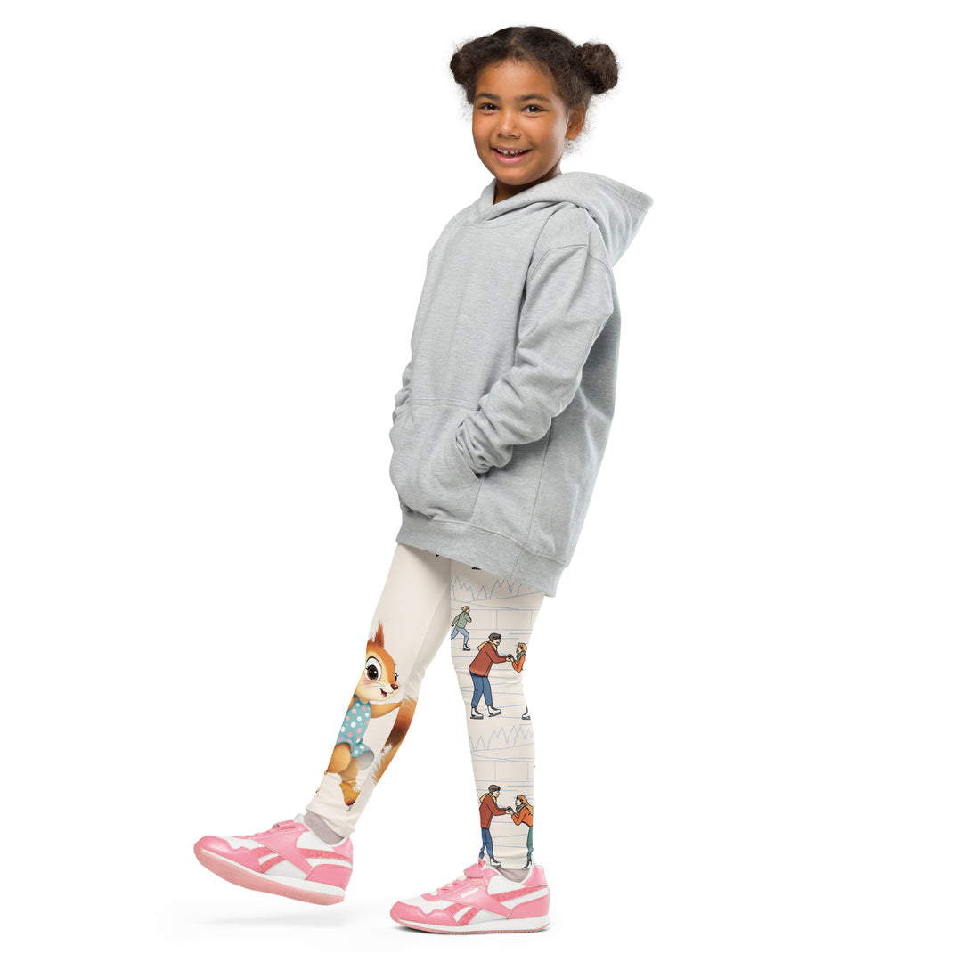 Frosty Twirl Squirrel Girls Leggings, beige background with a brown squirrel ice skating in a blue polka dot dress on one leg, ice trail lines, mountains, and small ice skaters along the other leg, in blue, brown, and orange tones, side view with one leg lifted and extended on model