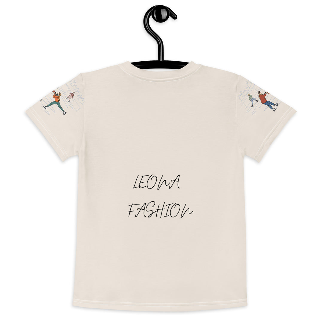Frosty Twirl Squirrel Girls T-shirt, beige background with a brown squirrel ice skating in a blue polka dot dress on the front, ice trail lines on the sleeves, mountains and ice skaters on the back, in blue, brown, and orange tones, back view on hanger-with a visible 'Leona Fashion' text on the design