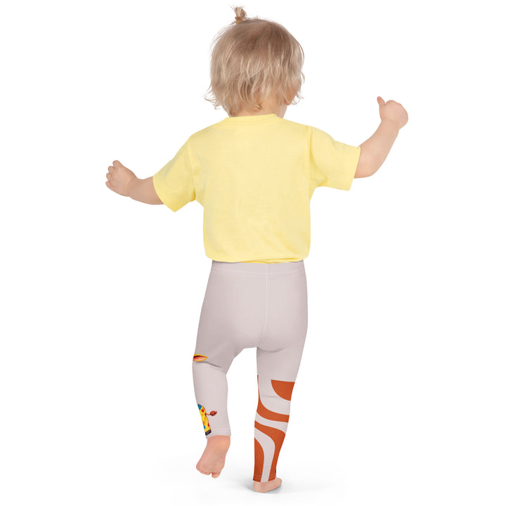  Giraffe Path Girls Leggings, cream background with a yellow giraffe featuring colorful polka dots on one leg, and orange-brown spots with dark gray giraffe footprints on the other leg, both designs starting from above the knee down, back pose on model
