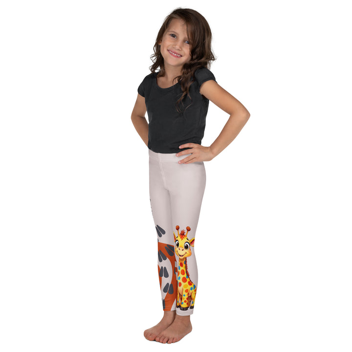 Giraffe Path Girls Leggings, cream background with a yellow giraffe featuring colorful polka dots on one leg, and orange-brown spots with dark gray giraffe footprints on the other leg, both designs starting from above the knee down, left side view on model