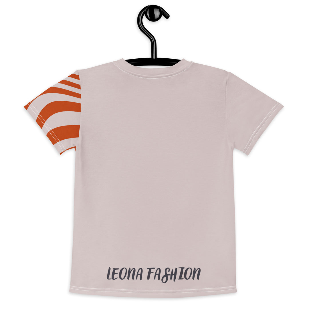 Giraffe Path Girls T-shirt, cream background with a smiling yellow giraffe featuring colorful polka dots on the front, dark gray giraffe paw prints behind, and brown-orange wavy lines on the left sleeve, back view on hanger-with a visible 'Leona Fashion' text on the design
