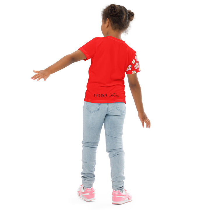 Heart Stinker Girls T-shirt, red background with a black and white skunk holding a white flower in its hand, black and white hearts and a white flower above, and pink-and-white floral details on the right sleeve, back angle with relaxed pose on model-with a visible 'Leona Fashion' text on the design