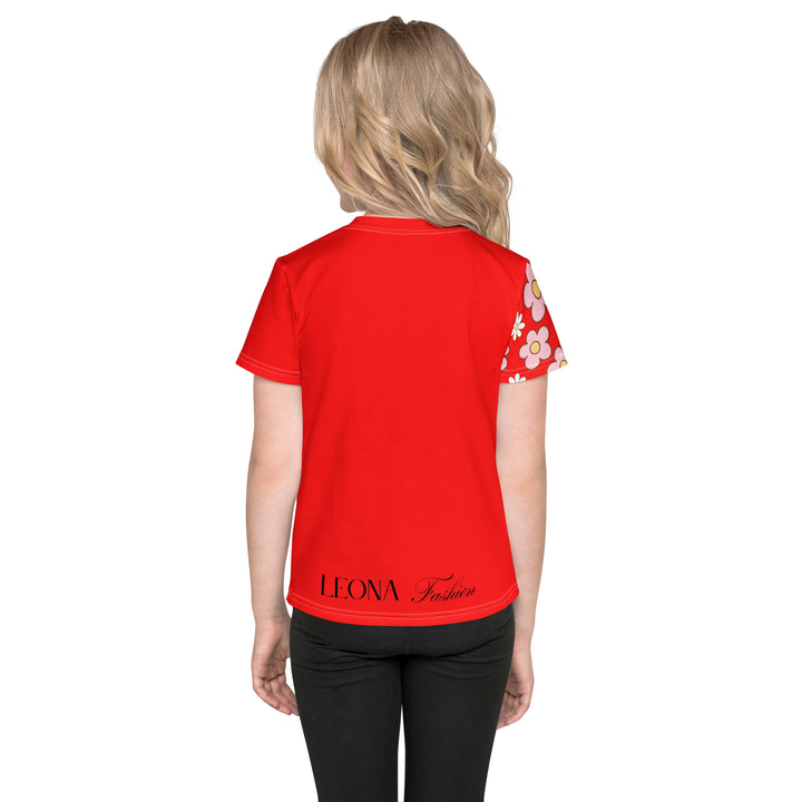 Heart Stinker Girls T-shirt, red background with a black and white skunk holding a white flower in its hand, black and white hearts and a white flower above, and pink-and-white floral details on the right sleeve, back view on model-with a visible 'Leona Fashion' text on the design