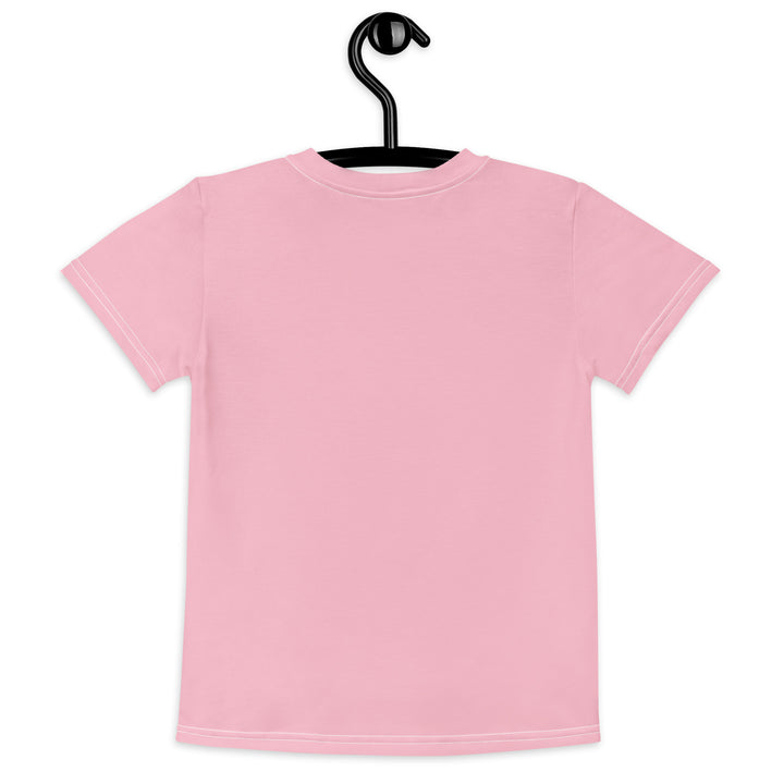  Jungle Parrot Girls T-shirt, light pink background with a red, yellow, orange, and green parrot standing on a branch on the front, back view on hanger
