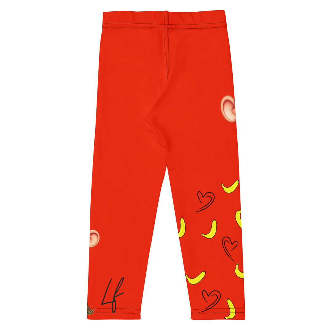 Love Monkey Girls Leggings, red background with a smiling female monkey with big eyes and a pink bow on the head at the top of one leg, yellow bananas with black drawn hearts below, and a winking male monkey wearing a hat sitting on a tree stump near the bottom of the other leg, with the word "LOVE" above, back view