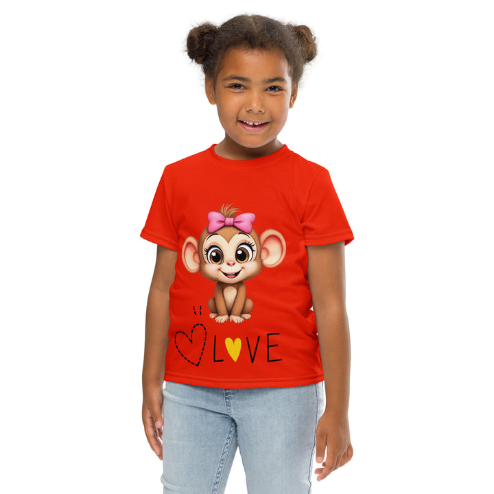 Love Monkey Girls T-shirt, red background with a smiling female monkey with a pink bow on her head and big eyes, sitting on a black "LOVE" text with a black and yellow heart, front pose with arms at sides on model