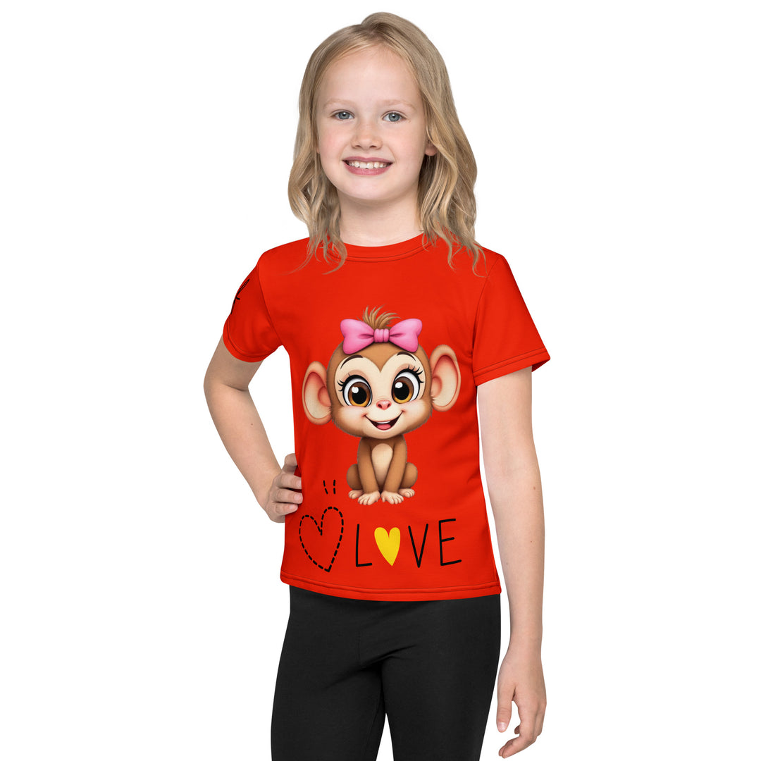 Love Monkey Girls T-shirt, red background with a smiling female monkey with a pink bow on her head and big eyes, sitting on a black "LOVE" text with a black and yellow heart, front view on model