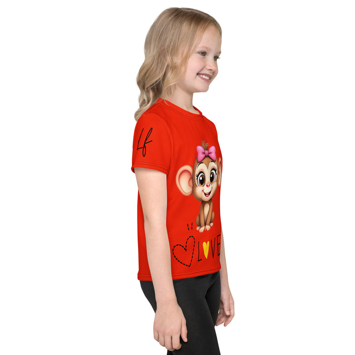  Love Monkey Girls T-shirt, red background with a smiling female monkey with a pink bow on her head and big eyes, sitting on a black "LOVE" text with a black and yellow heart, left side view on model
