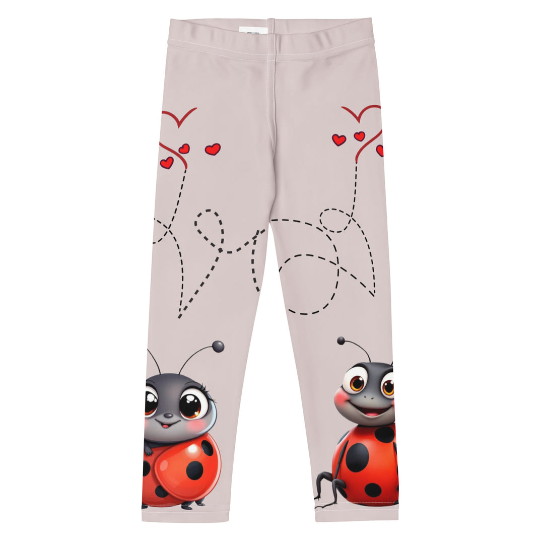  Lovebugs Girls Leggings, sand-colored background with a female ladybug with big eyes at the bottom of one leg and a male ladybug looking delighted on the other leg, with black swirling lines above them forming hearts on both sides, front view