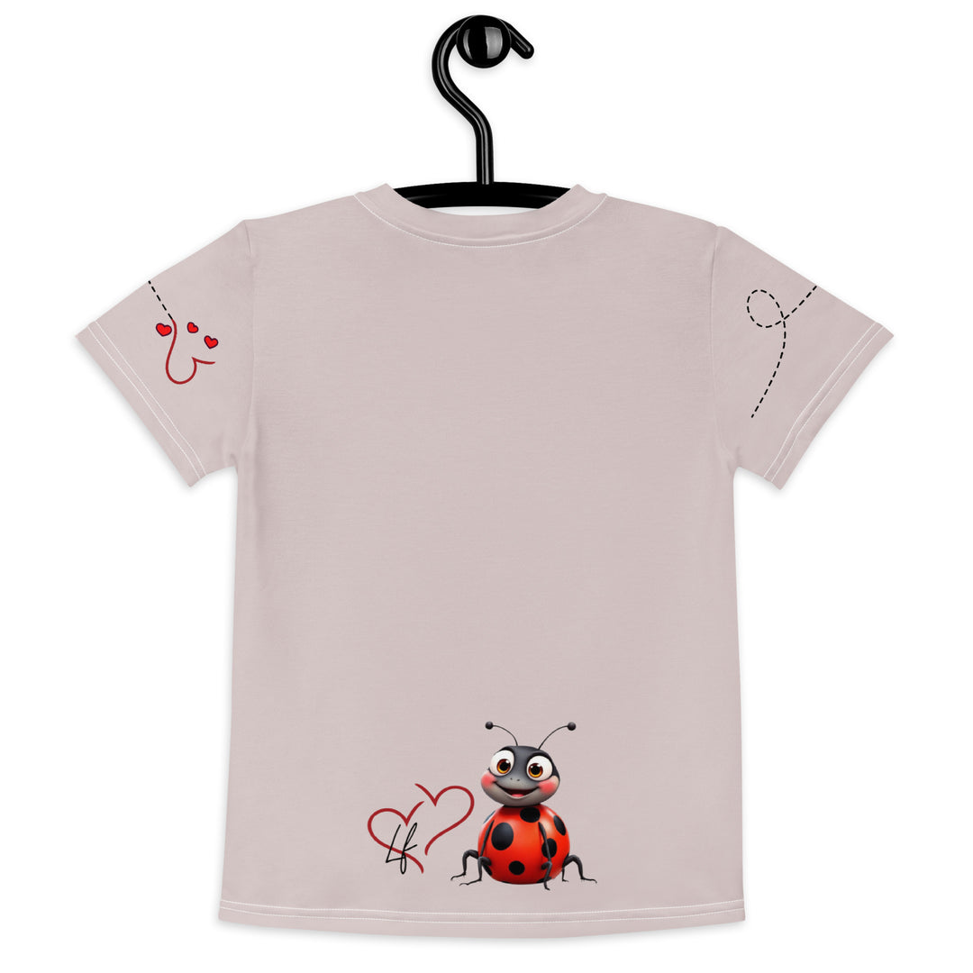 Lovebugs Girls T-shirt, sand-colored background with a smiling female ladybug with big eyes on the front, a happy male ladybug with a heart beside him on the back, and hearts with connecting lines on both sleeves, back view on hanger