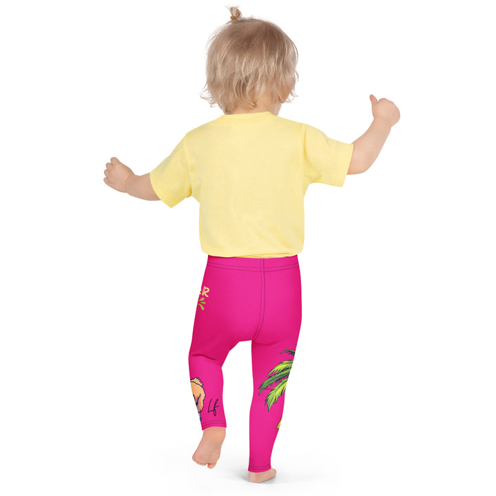 Palma Llama Girls Leggings, pink background with a palm tree wearing sunglasses and holding a cocktail on one leg, and a llama with sunglasses and "SUMMER VIBES" text above on the other leg, designs covering almost the full length of each leg, back pose on model