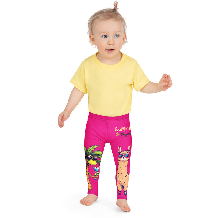  Palma Llama Girls Leggings, pink background with a palm tree wearing sunglasses and holding a cocktail on one leg, and a llama with sunglasses and "SUMMER VIBES" text above on the other leg, designs covering almost the full length of each leg, front close-up view on model
