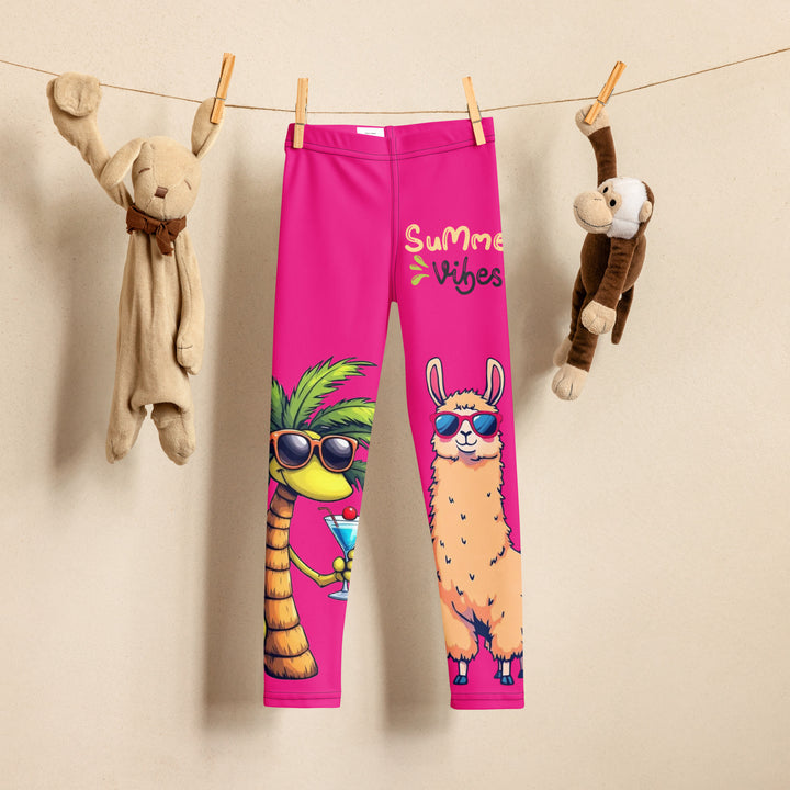 Palma Llama Girls Leggings, pink background with a palm tree wearing sunglasses and holding a cocktail on one leg, and a llama with sunglasses and "SUMMER VIBES" text above on the other leg, designs covering almost the full length of each leg, front view on hanger