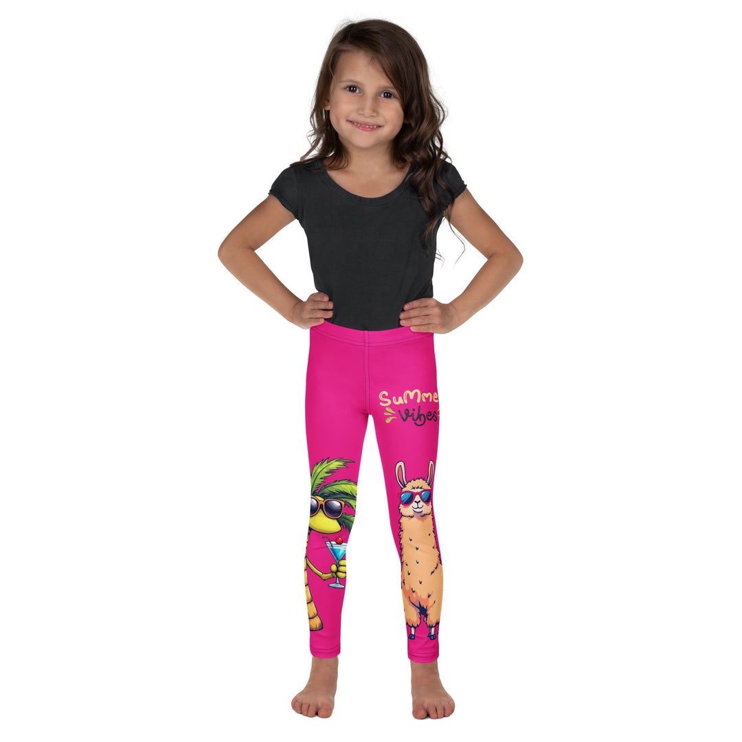 Palma Llama Girls Leggings, pink background with a palm tree wearing sunglasses and holding a cocktail on one leg, and a llama with sunglasses and "SUMMER VIBES" text above on the other leg, designs covering almost the full length of each leg, front view on model