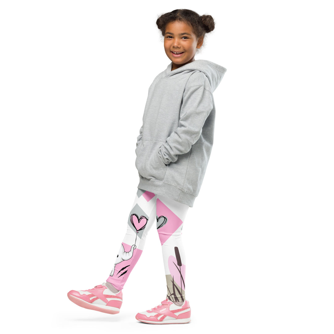 Pastel Elephant Love Girls Leggings, white background with gray elephant holding a pink heart-shaped balloon, surrounded by gray and pink hearts, pink and gray rectangles, and floral accents in matching colors, front view with one leg lifted and extended on model