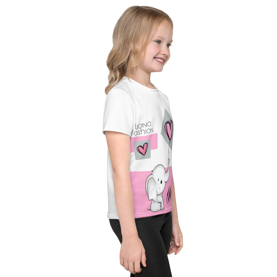 Pastel Elephant Love Girls T-shirt, white background with gray elephant holding a pink balloon, and a second pink balloon floating next to it, surrounded by pink hearts and pink and gray rectangles, right side view on model-with a visible 'Leona Fashion' text on the design