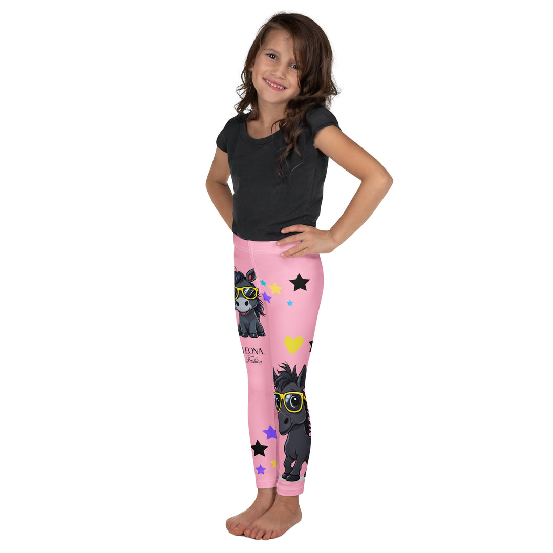 Pony Cool Girls Leggings, pink background with two black ponies wearing sunglasses and star details, back pose shown on model - model showing side profile-with a visible 'Leona Fashion' text on the design