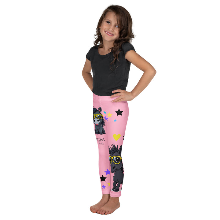 Pony Cool Girls Leggings, pink background with two black ponies wearing sunglasses and star details, back pose shown on model - model showing side profile-with a visible 'Leona Fashion' text on the design