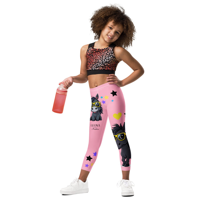 Pony Cool Girls Leggings, pink background with two black ponies wearing sunglasses and star details, front-facing look shown on model-with a visible 'Leona Fashion' text on the design