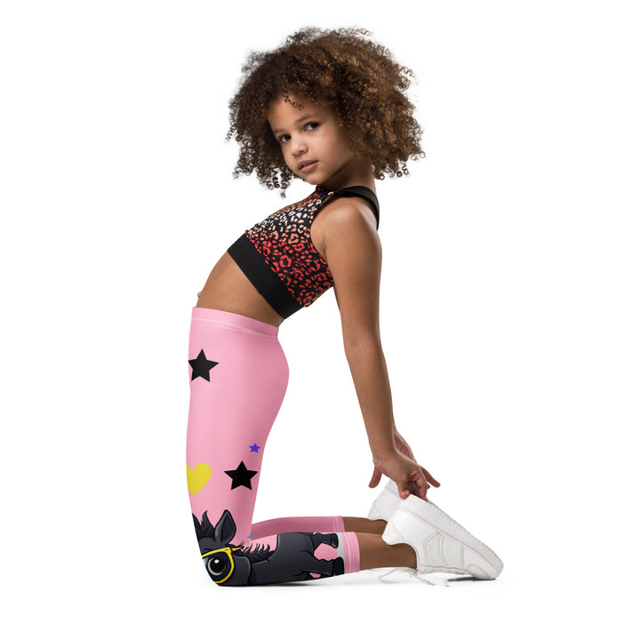 Pony Cool Girls Leggings, pink background with two black ponies wearing sunglasses and star details - side stance on model