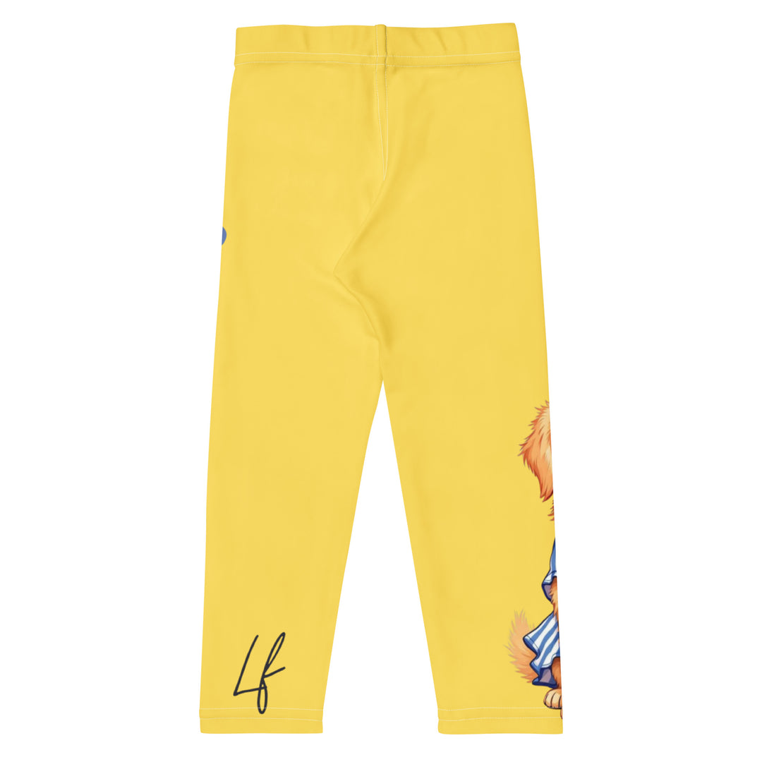 Puppy & Bones Girls Leggings, yellow background with a golden retriever puppy wearing a blue and white striped outfit and a matching blue and white bow on the head on one leg, and blue paw prints and blue bones running down the other leg, back view