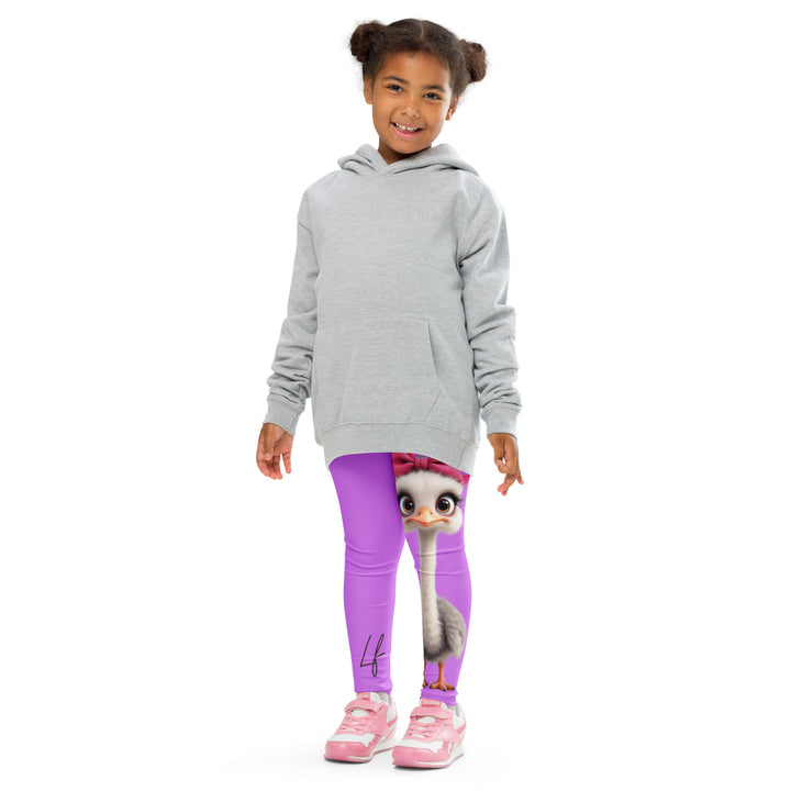 Purple Baby Ostrich Girls Leggings, purple background with a white and gray baby ostrich girl featuring a pink bow on her head extending almost the full length of one leg, front pose with arms at sides on model