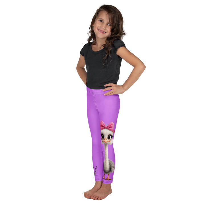 Purple Baby Ostrich Girls Leggings, purple background with a white and gray baby ostrich girl featuring a pink bow on her head extending almost the full length of one leg, left side view on model
