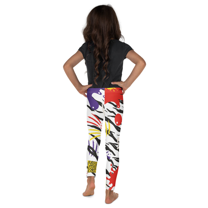 Raccoon Bandit Glow Girls Leggings, white base with splash-like spots in red, purple, and yellow, gray raccoon head, and wavy black stripes, back view on model